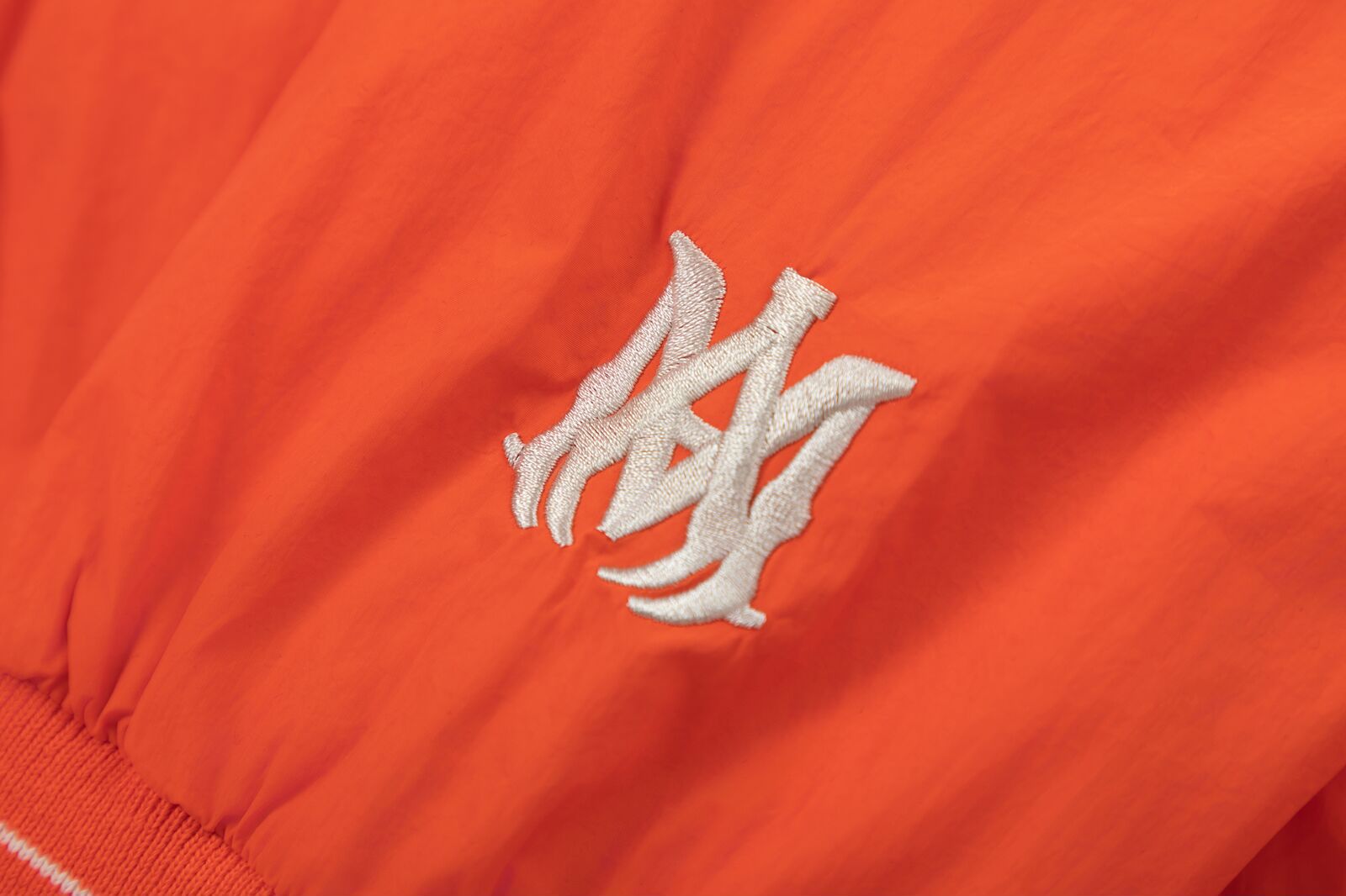 AMIRI Logo-Appliquรฉd Padded Shell Bomber Jacket