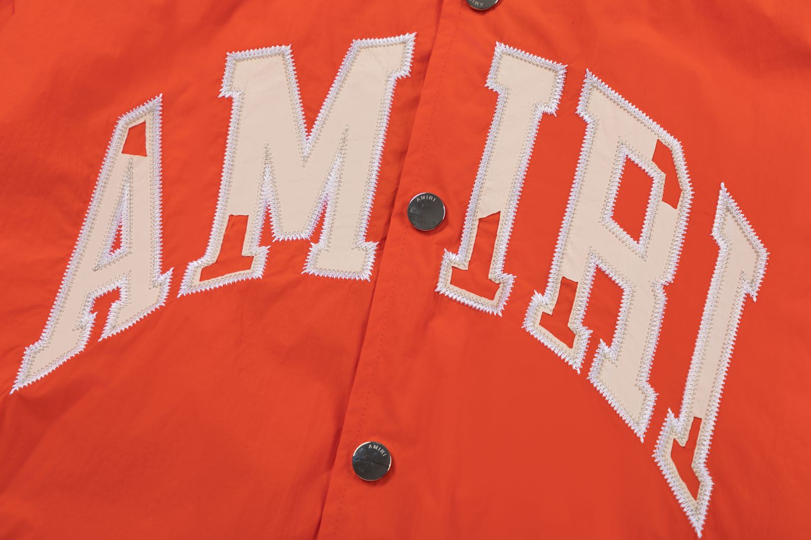 AMIRI Logo-Appliquรฉd Padded Shell Bomber Jacket